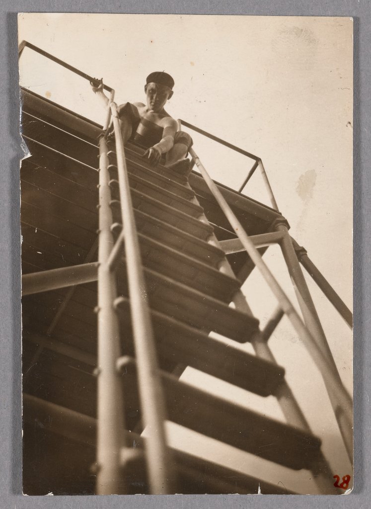 Untitled (Alfred Arndt on a metal scaffolding ladder), Gertrud Arndt