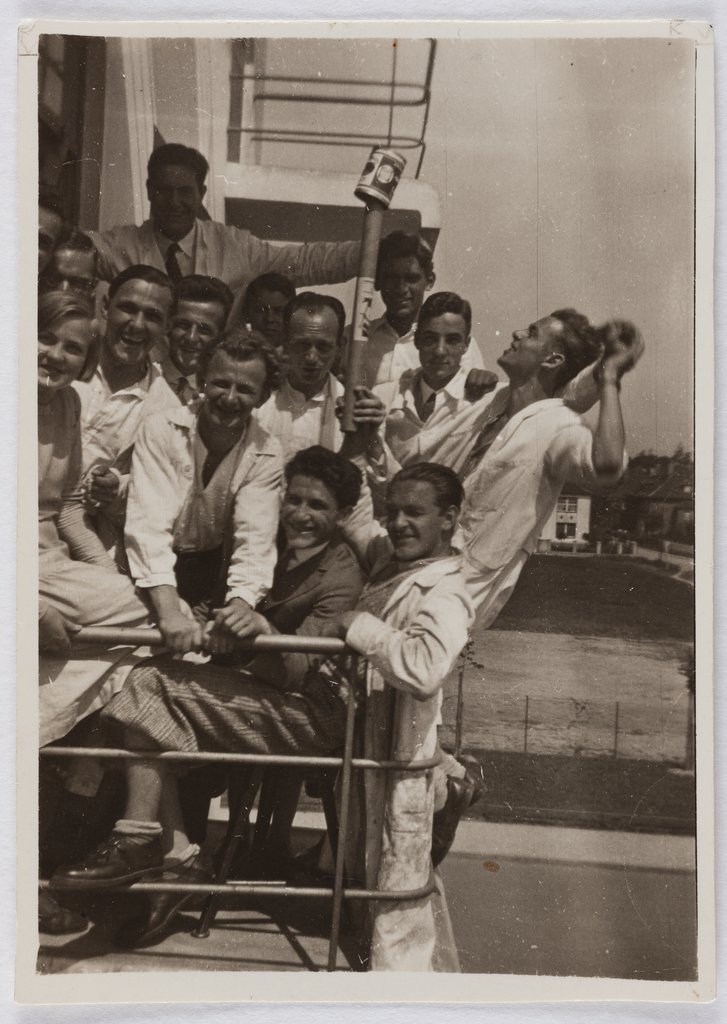 Students on a balcony of the Studio Building, from the series 'Bauhaus Heads'., Fritz Schreiber